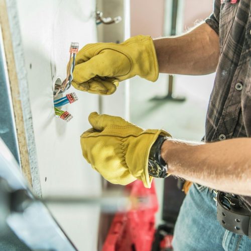 Electrician Installing Outlet