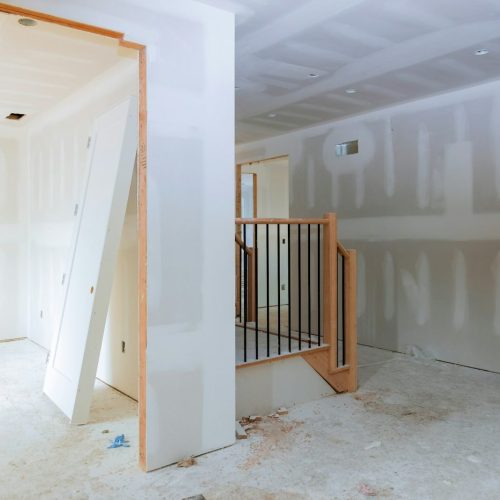 walls-plasterboards-with-room-under-construction-with-finishing-putty-in-the-room.jpg